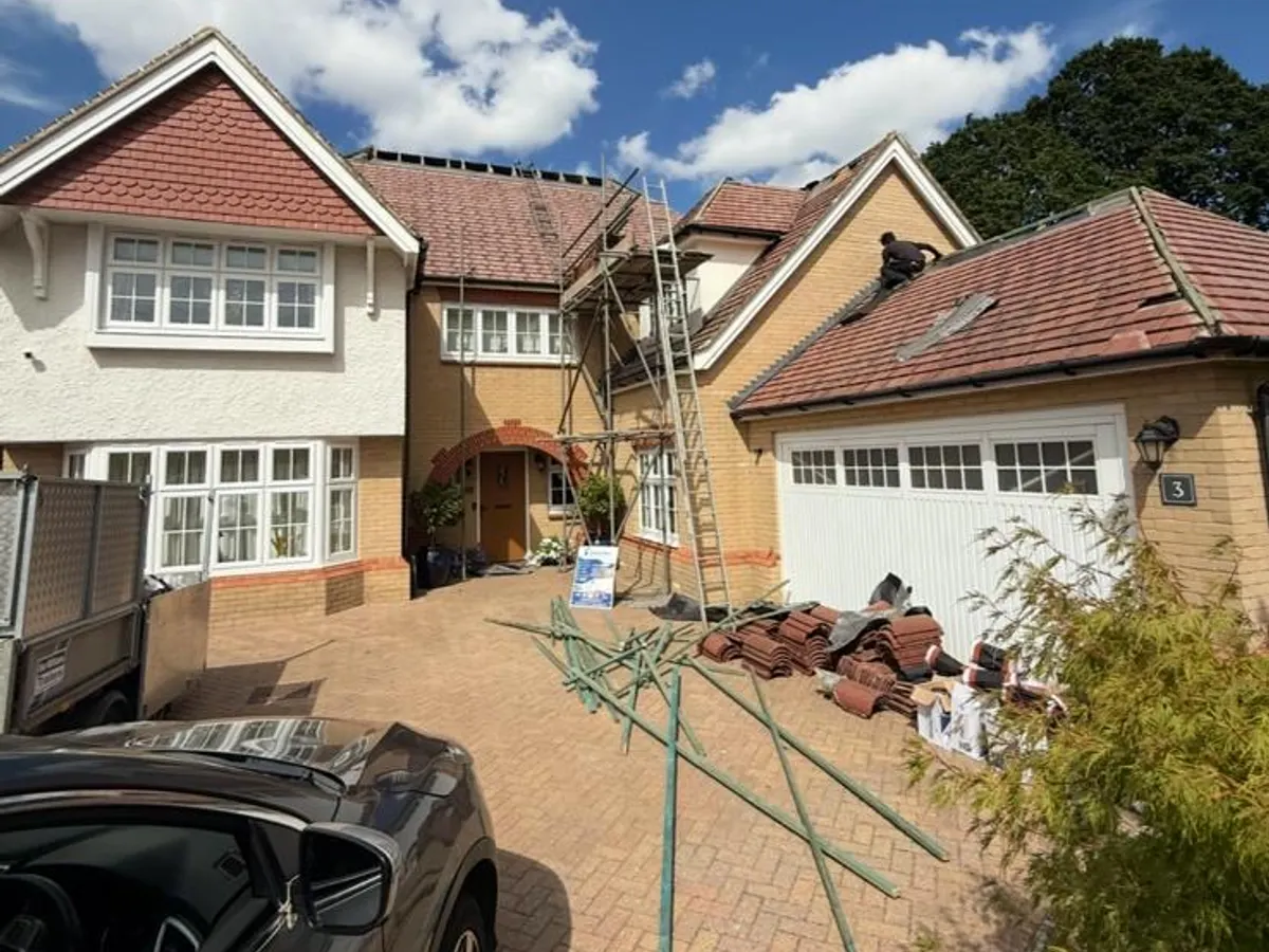 Scaffolded house during a Steadfast roofing job