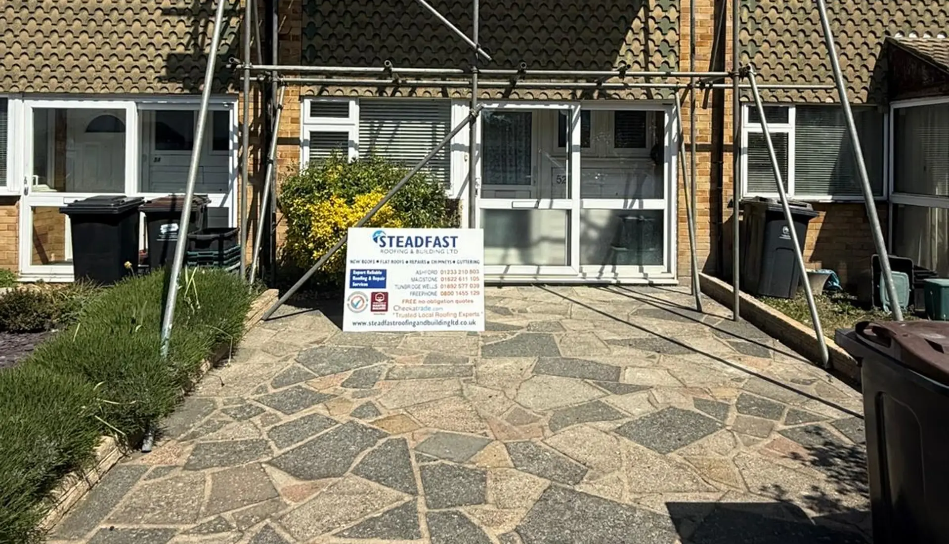 A Steadfast roofing job with scaffolding in place